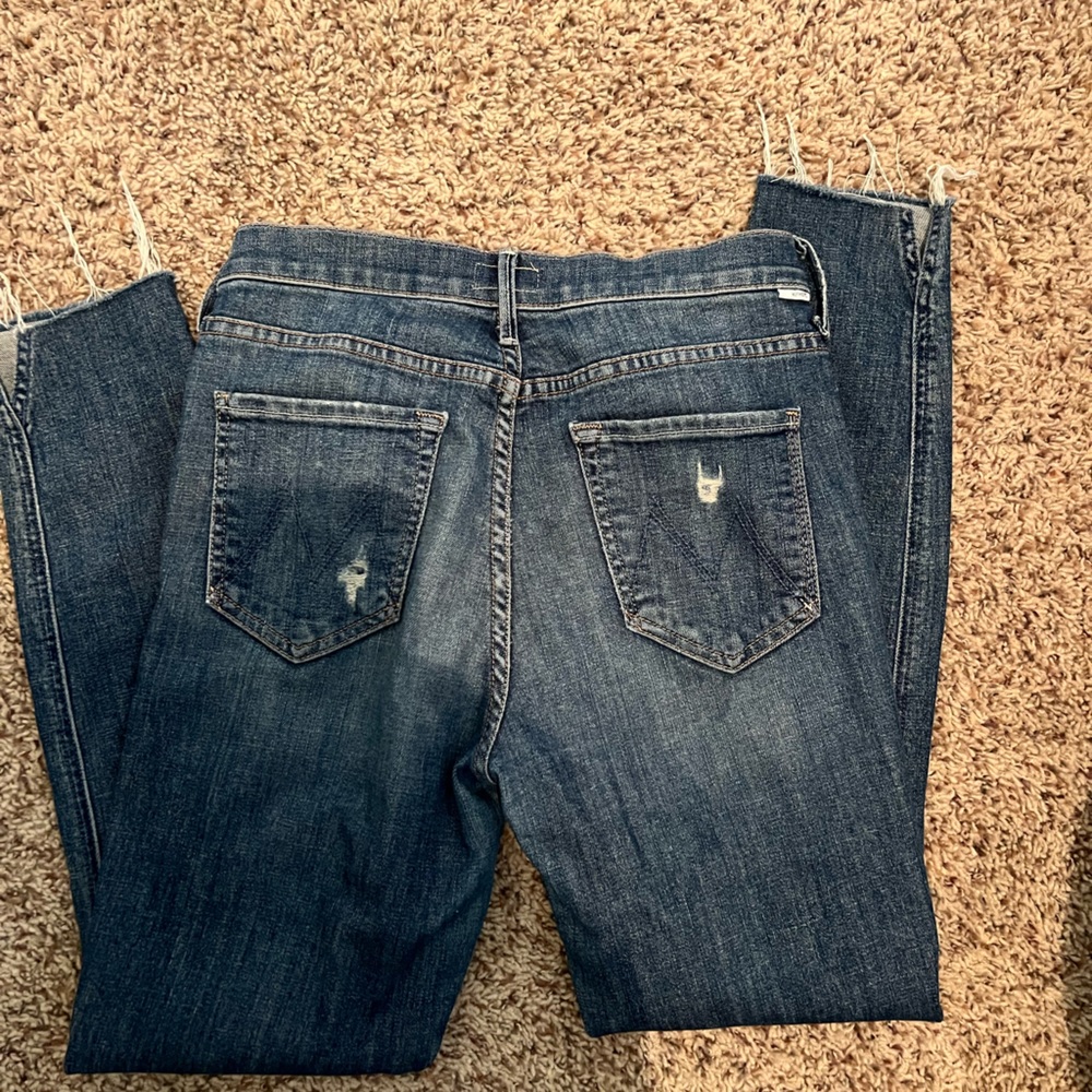 Mother denim with rips